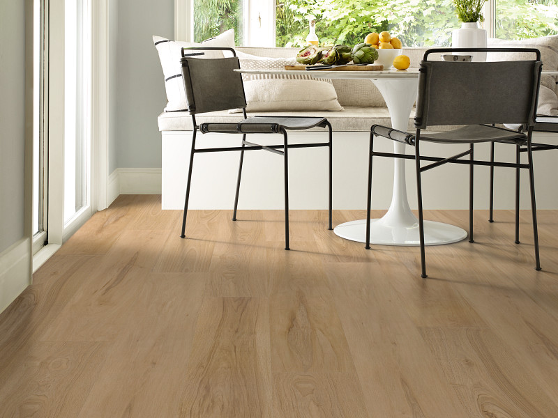 Chaise Tan flooring in a room