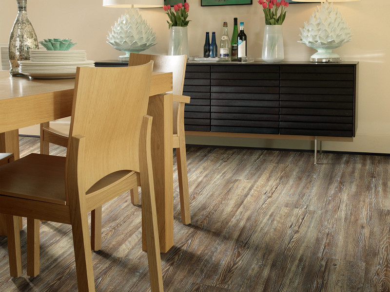 Tattered Barnboard flooring in a room